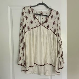 Free People embroidered peasant top. Size Small